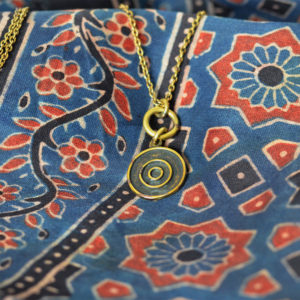Bullseye Necklace on Ajrakh Tassled Blue and Red Stole